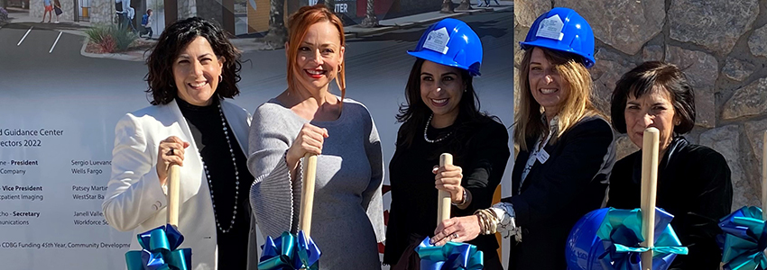 women at groundbreaking with shovels